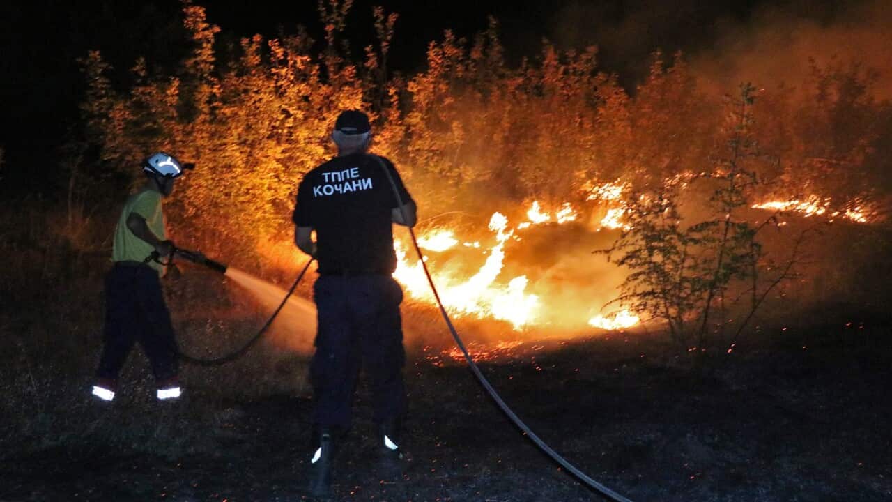 OCANI, NORTH MACEDONIA - AUGUST 03: Smoke and flames rise during a forest fire in Kocani, in the eastern part of North Macedonia on August 03, 2021.