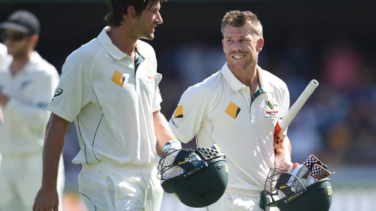 Australian batsmen David Warner (R) and Joe Burns (L)