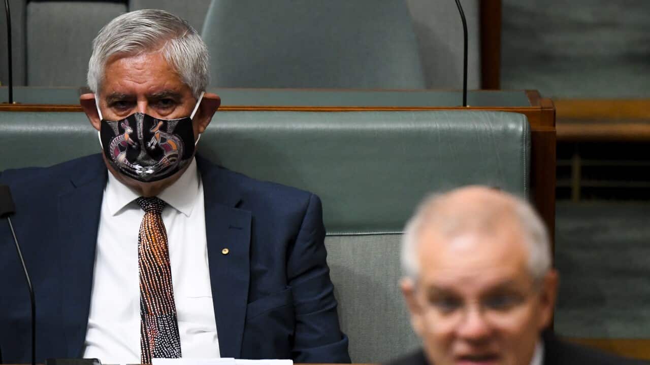 Minister for Indigenous Australians Ken Wyatt listens to Prime Minister Scott Morrison