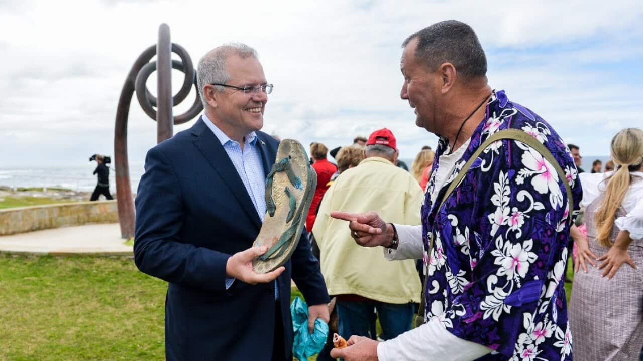 Prime Minister Scott Morrison and survivor Dave Byron at the 16th Anniversary Commemoration Ceremony in the memory of victims of the 2002 Bali Bombings at the Bali Memorial in Sydney (AAP)