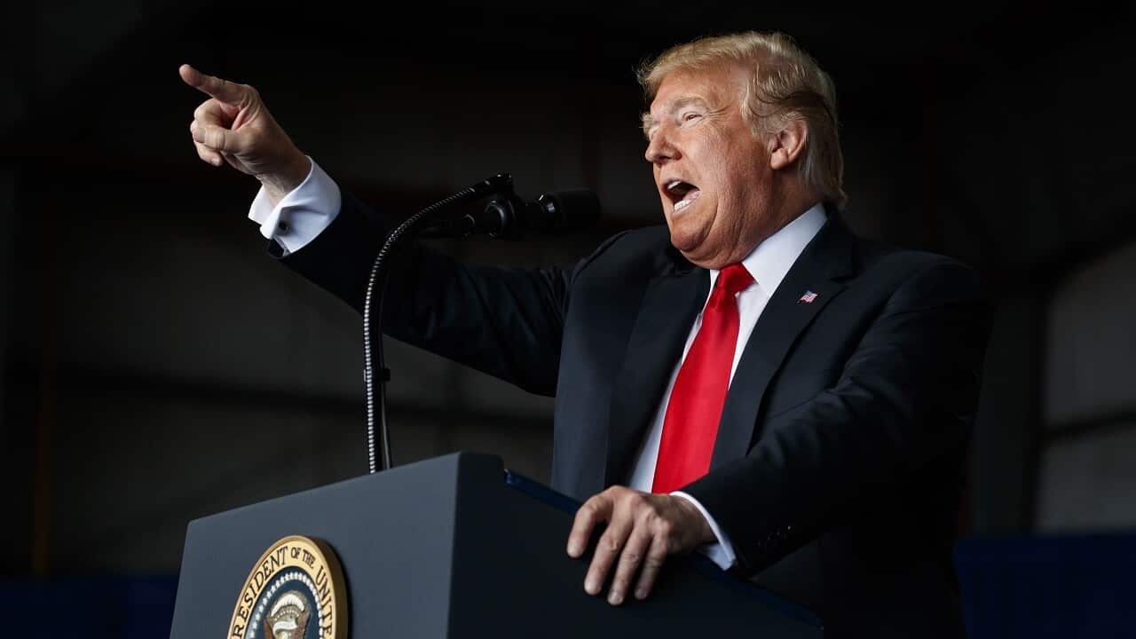 President Donald Trump speaks during a campaign rally on Sunday.
