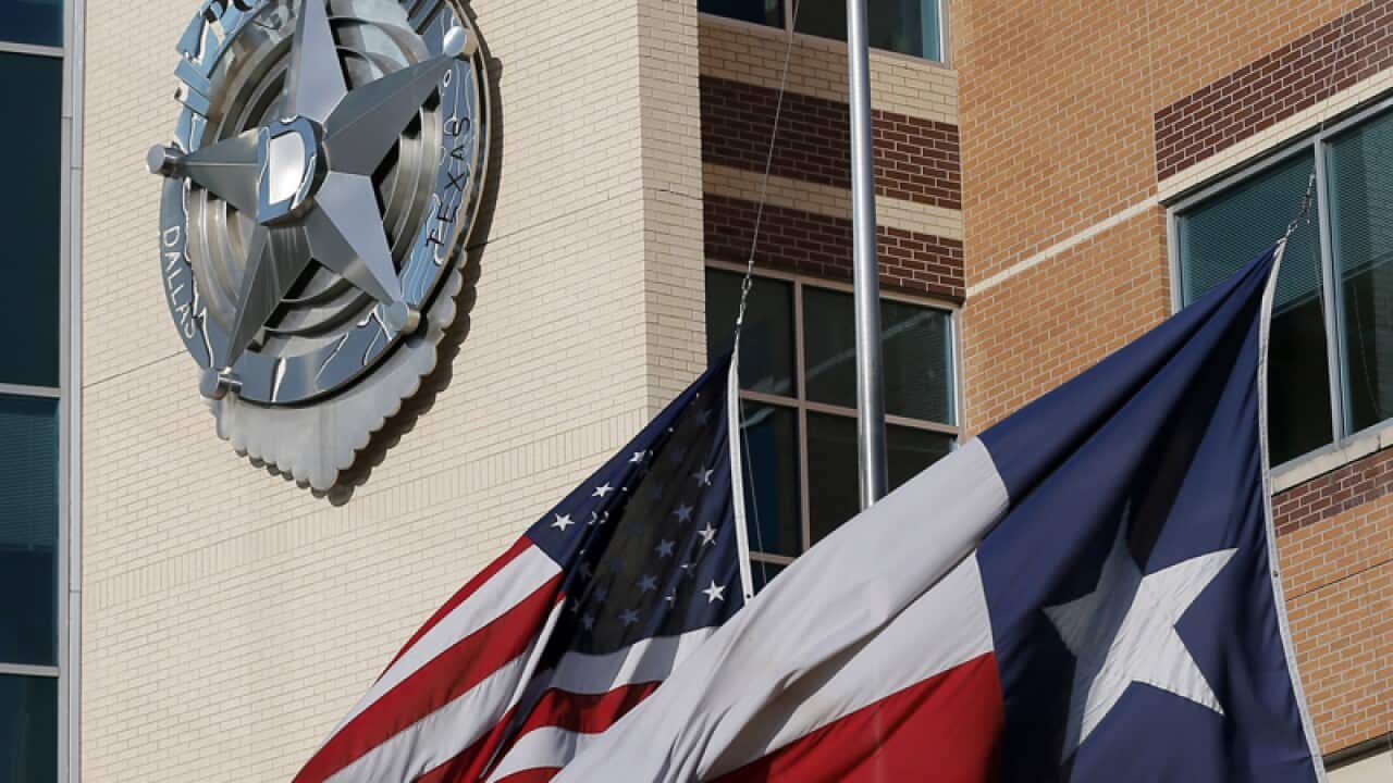 The American and Texas flag at the Dallas police department
