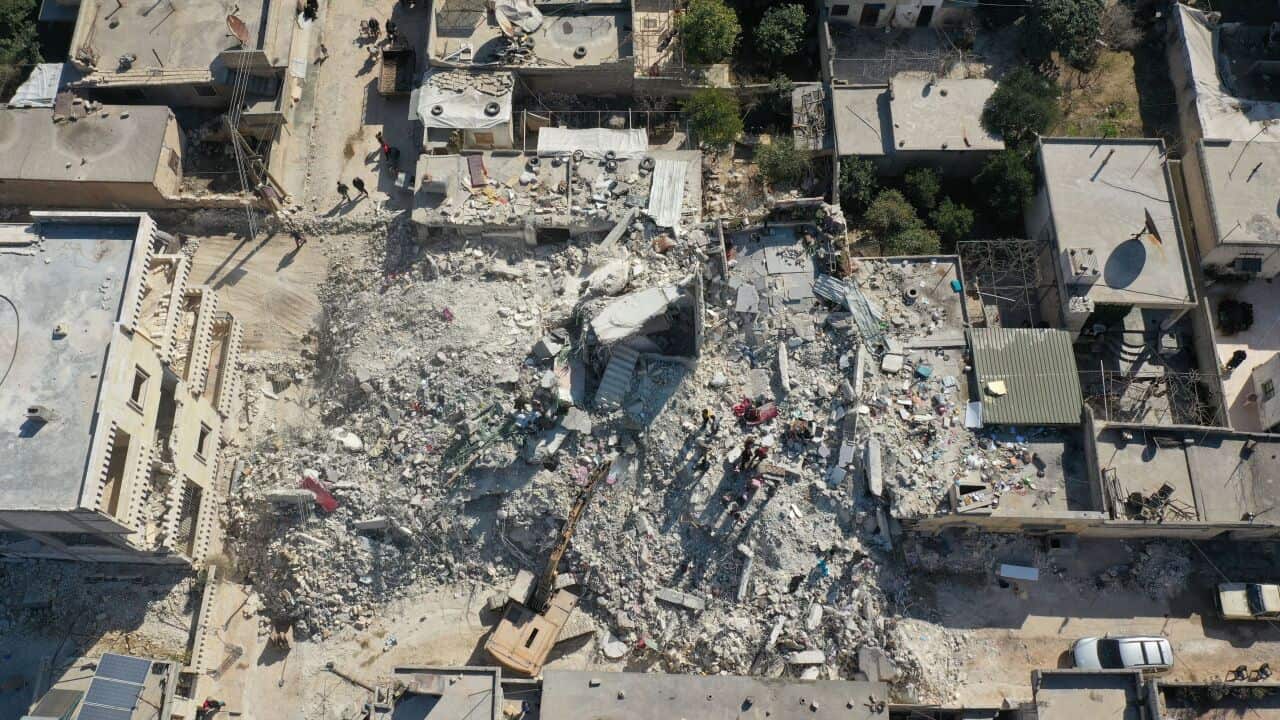 The rubble of collapsed and semi-collapsed buildings in the Syrian rebel-held town of Jindayris