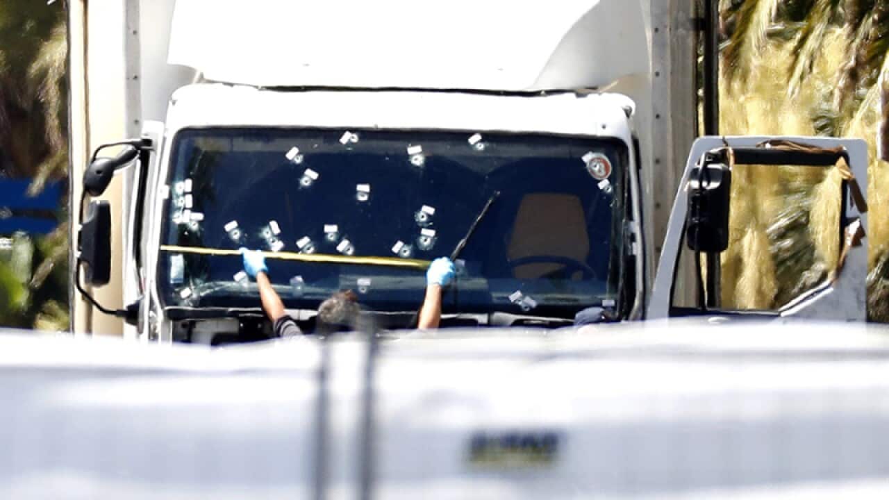 Crime scene investigator works on the truck