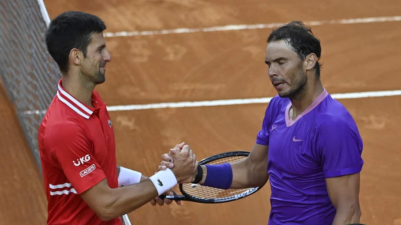 Novak Djokovic and Rafael Nadal shake hands after their another epic match in Rome final