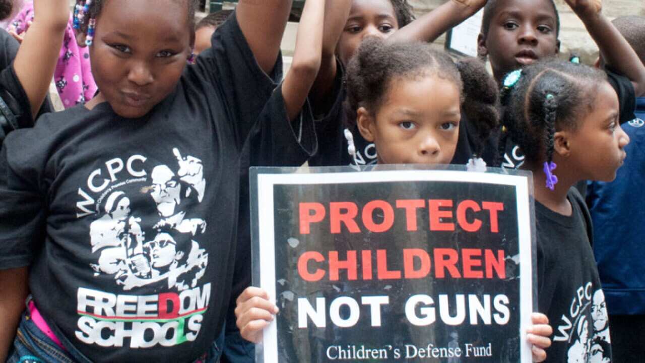 A march in the streets of Chicago by children protesting against gun violence