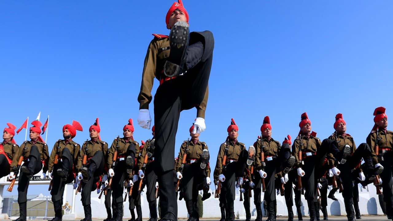 Newly graduated soldiers of the Jammu and Kashmir Light Infantry march during their commencement parade at a military base on the outskirts of Srinagar, India, Saturday, March 8, 2014.