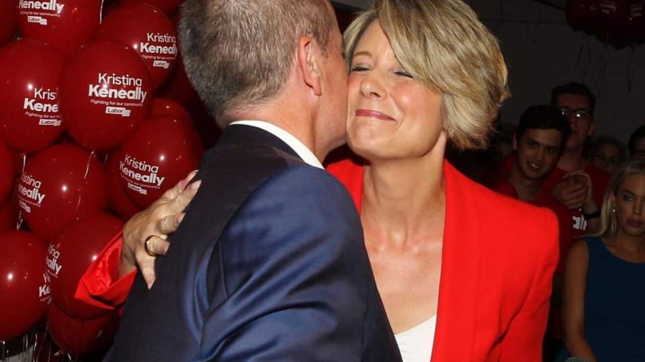 Kristina Keneally embraces Labor leader Bill Shorten after conceding.