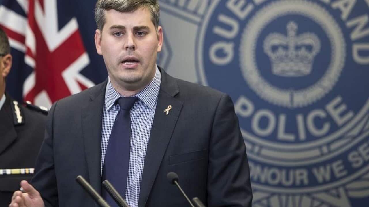 Mark Ryan speaking to the media