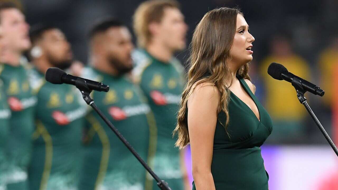 Indigenous woman Olivia Fox sings Australia's national anthem during the Tri Nations rugby match between the Pumas and Wallabies on 5 December 2020.