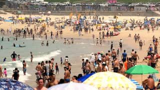 People at a busy beach.