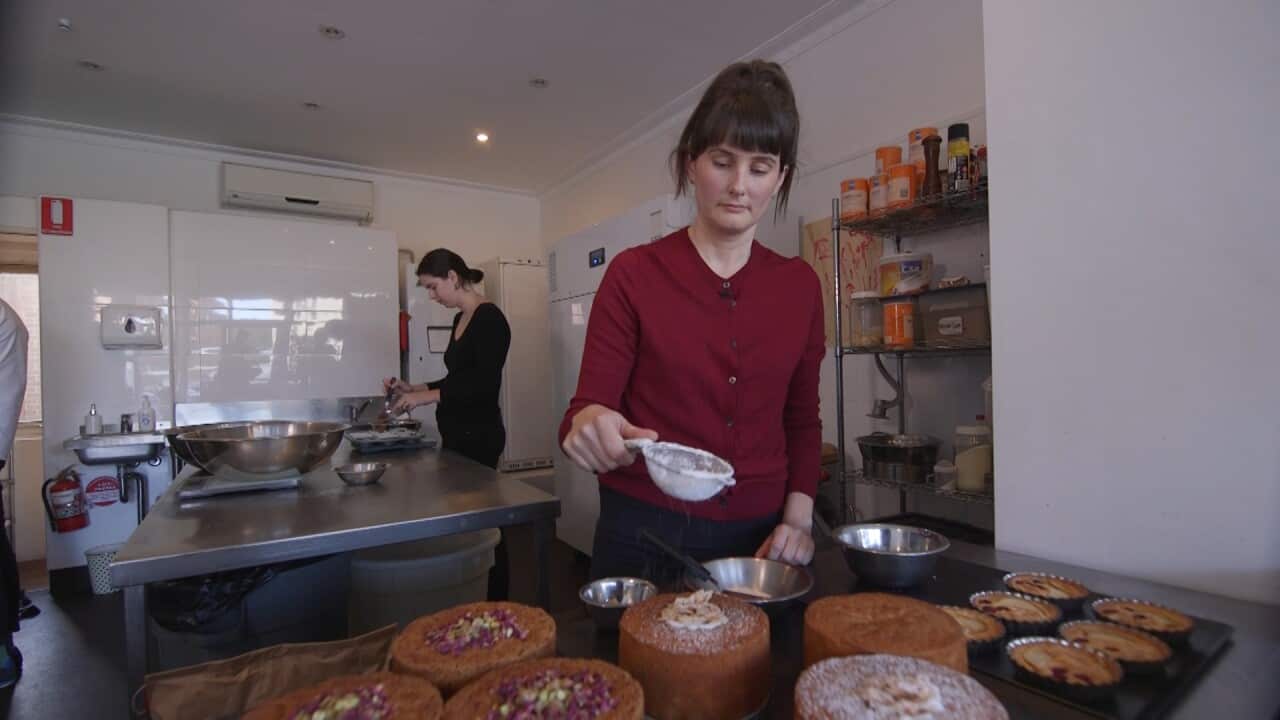 Nina Siljanovic preparing her baked goods.