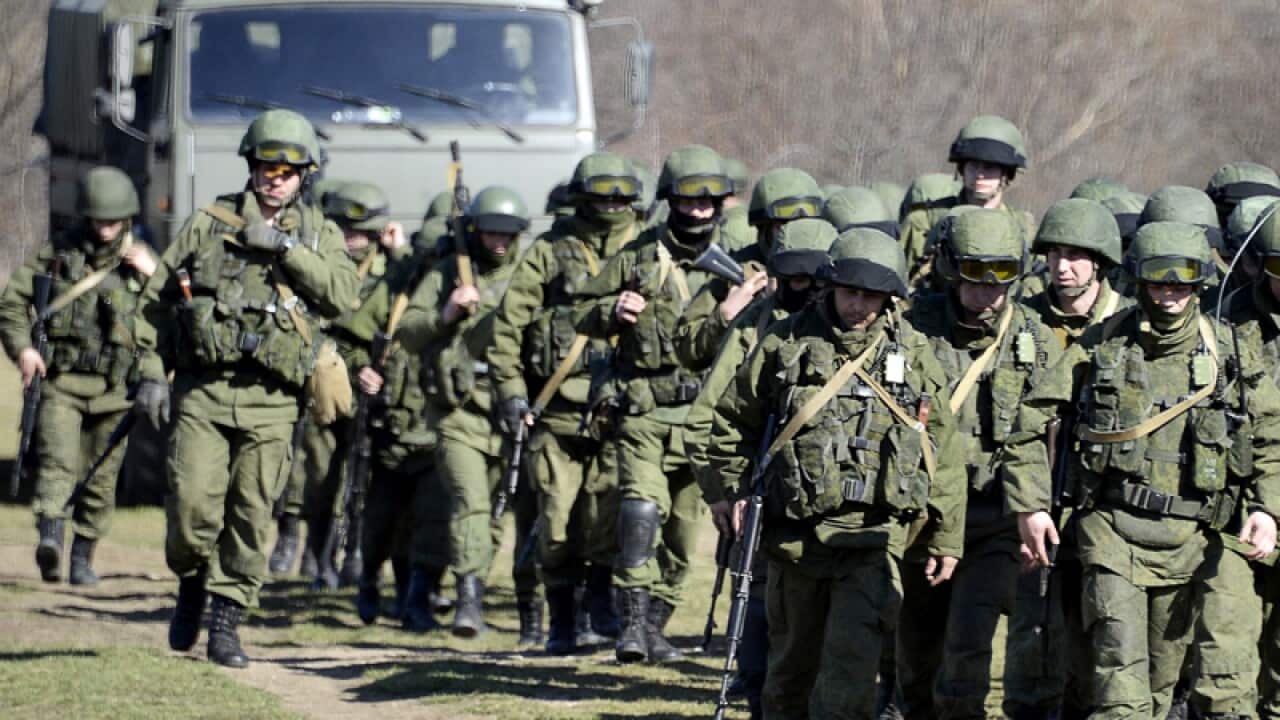 Armed men armed block access to a Ukrainian border guards base