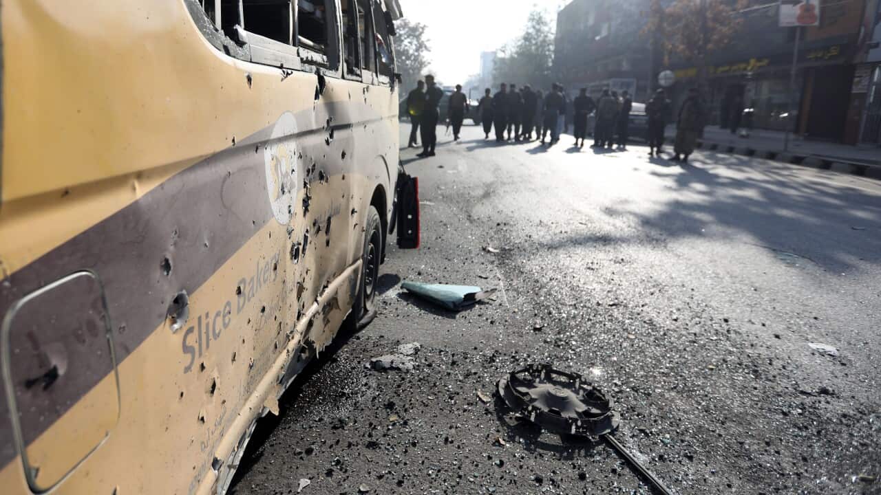 Afghan security forces cordon off the area of a rocket attack site in Kabul, Afghanistan on 21 November 2020