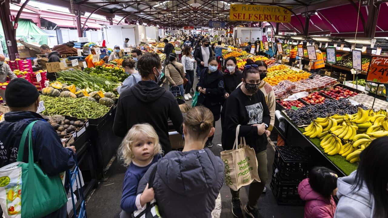 Customers are seen at the Queen Victoria Market in Melbourne, Saturday, October 23, 2021. Melbourne has emerged from the world's longest lockdown, and as vaccination rates continue to rise, even more freedoms are less than two weeks away. (AAP Image/Danie