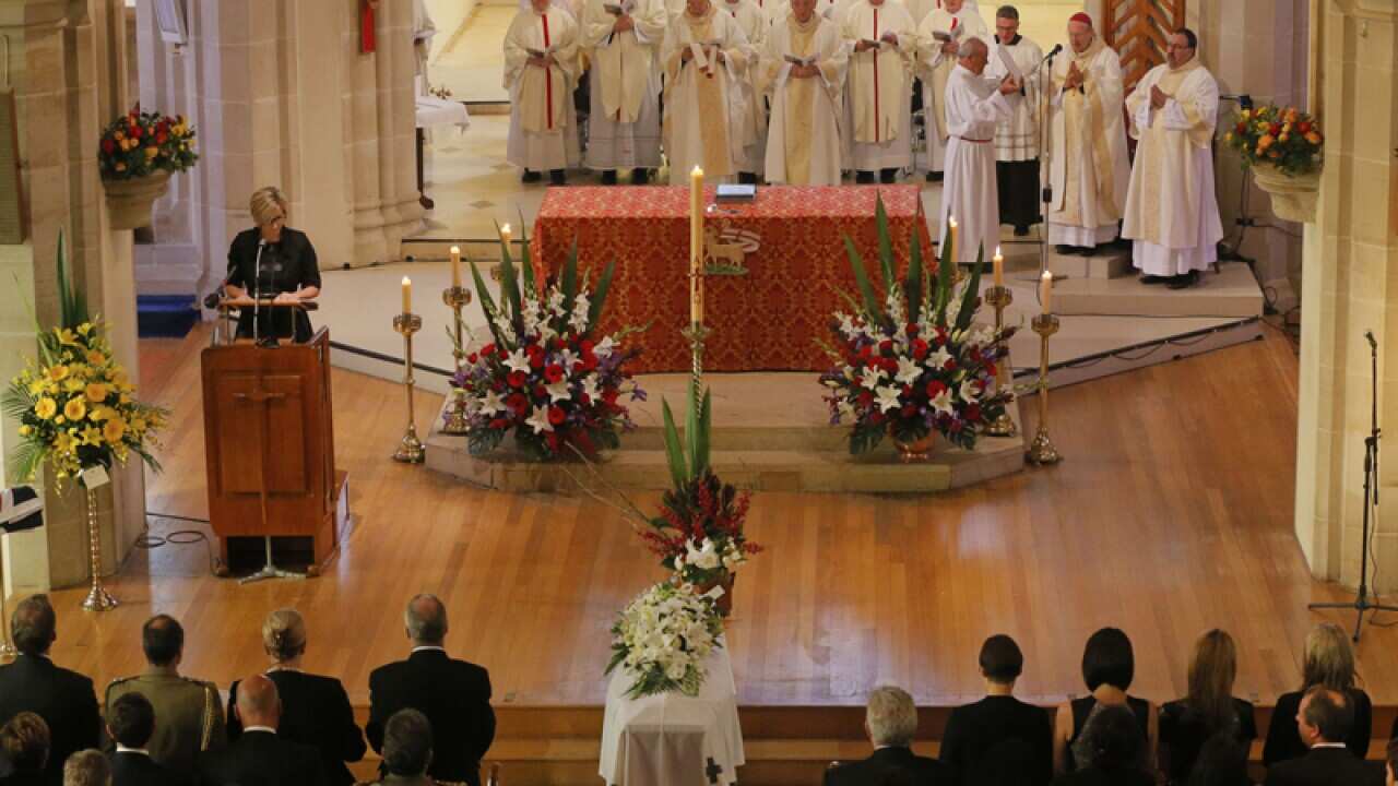 Mourners gather at the state funeral of former senator Brian Harradine
