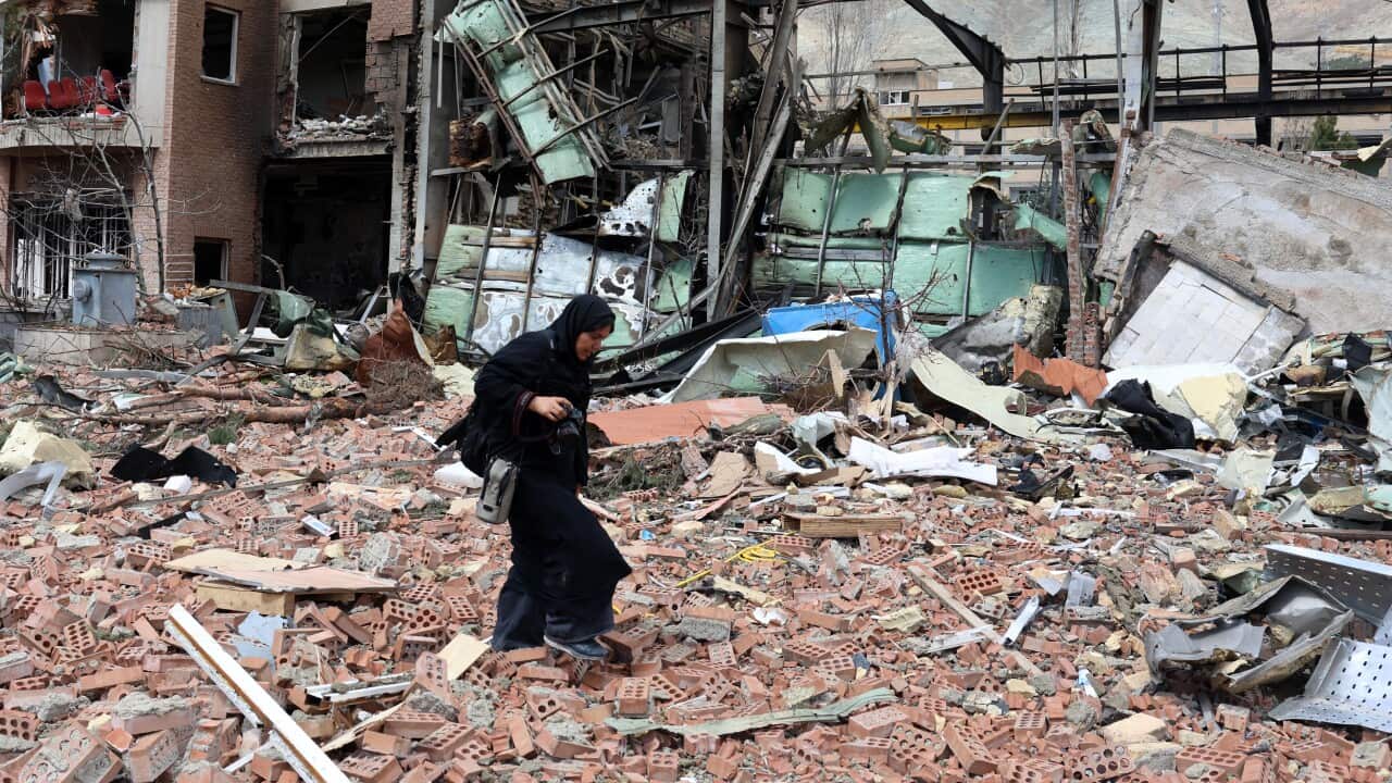 A woman walks amid the debris after US-Israeli airstrikes on the Shahid Beheshti University, in Tehran, Iran, 04 April 2026.