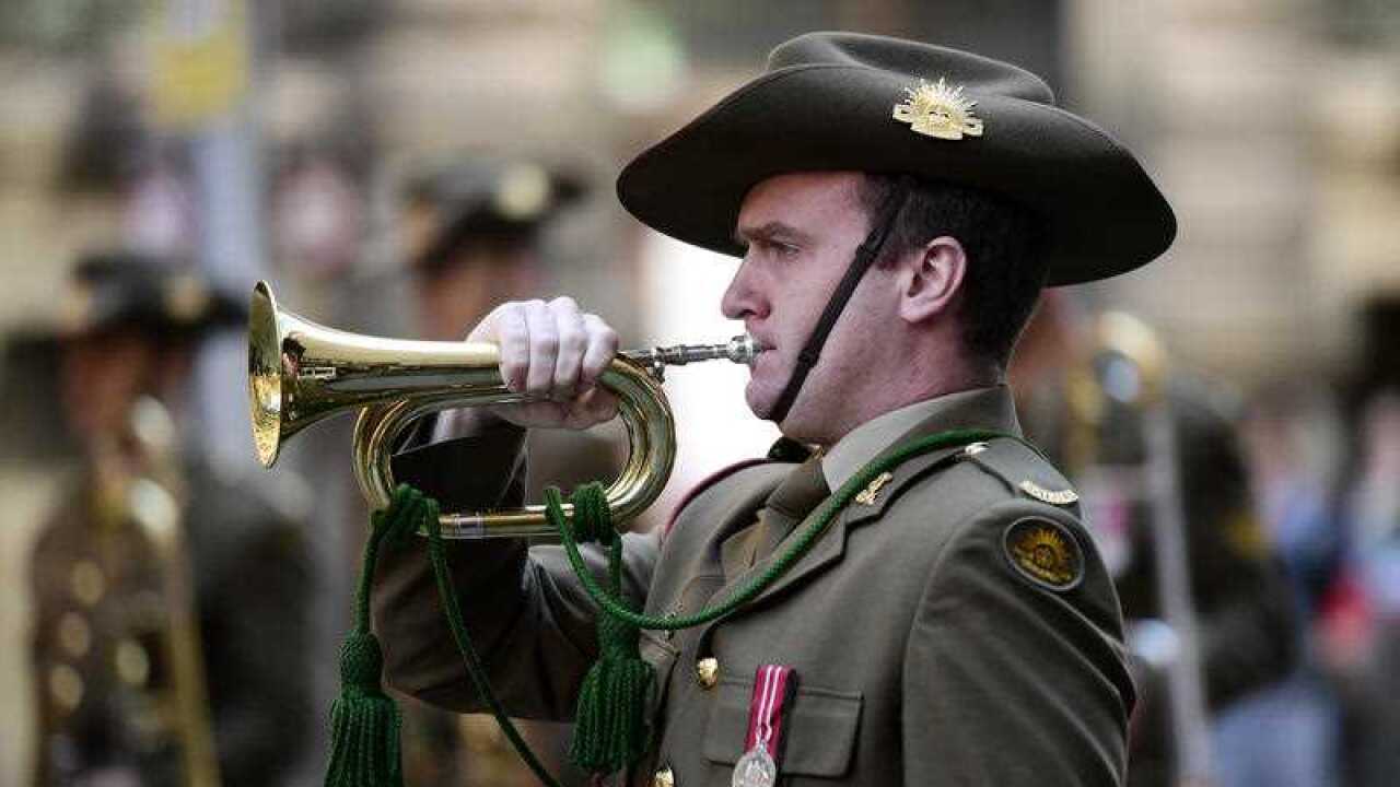 A member of the Australian Army Band Sydney performs during the Vietnam Veterans Memorial Day Service at the Cenotaph.