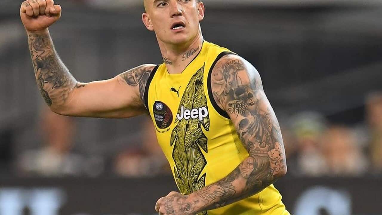 Dustin Martin of the Tigers reacts after kicking a goal