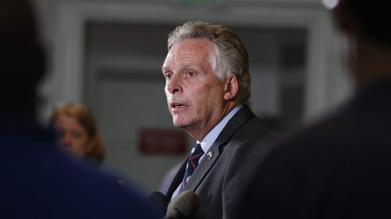 Virginia Governor Terry McAuliffe addresses a news conference concerning the alt-right rally and violence in Charlottesville.