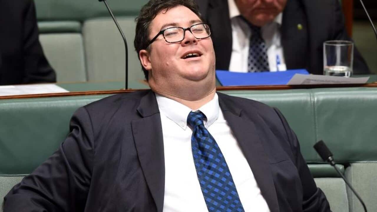 Coalition MP George Christensen reacts.