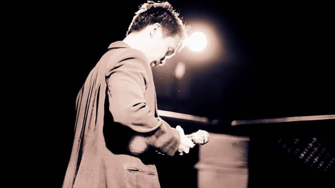 Bryan Yap performing for a gig