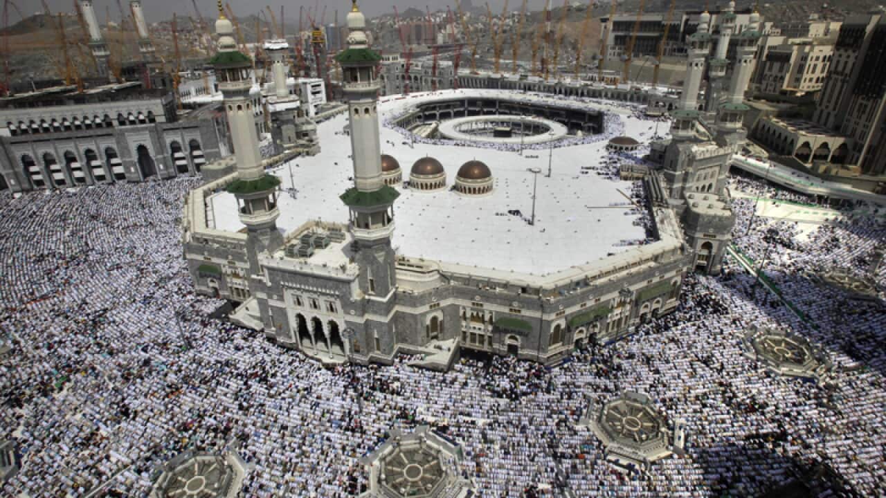 Muslim pilgrims attend Friday prayers at the Grand Mosque in Mecca