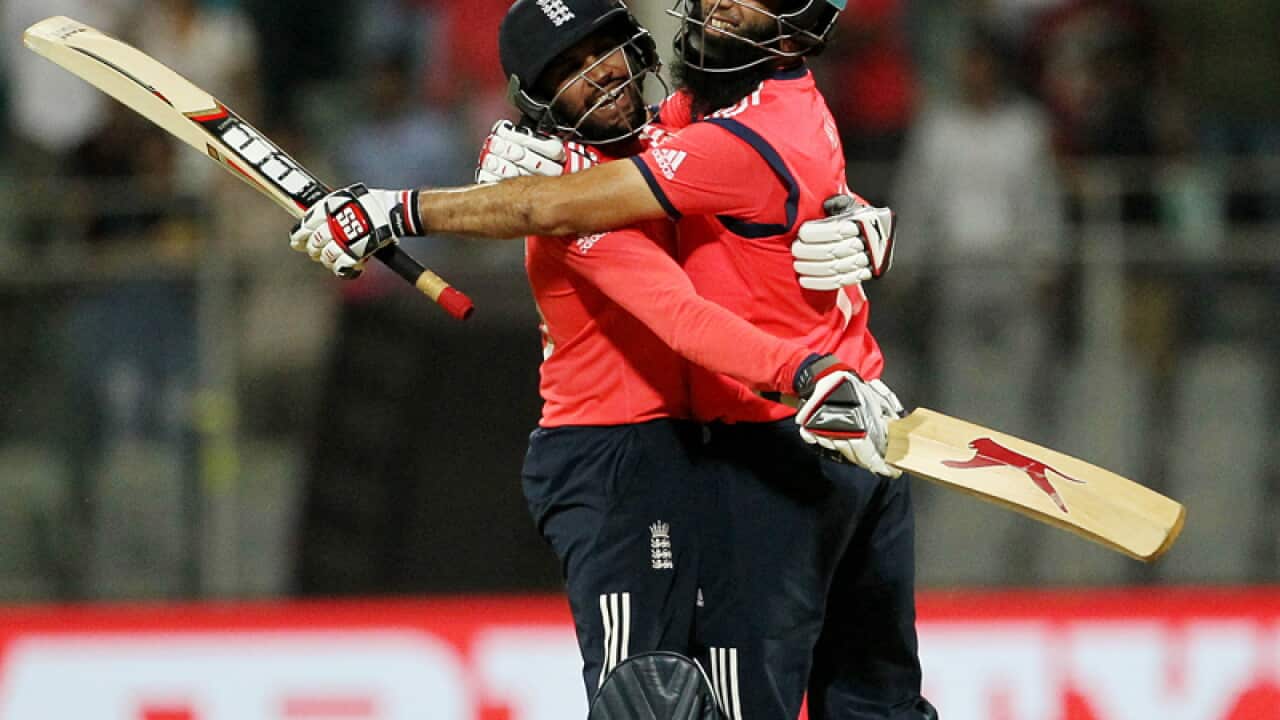 England's Adil Rashid (L) celebrates with Moeen Ali