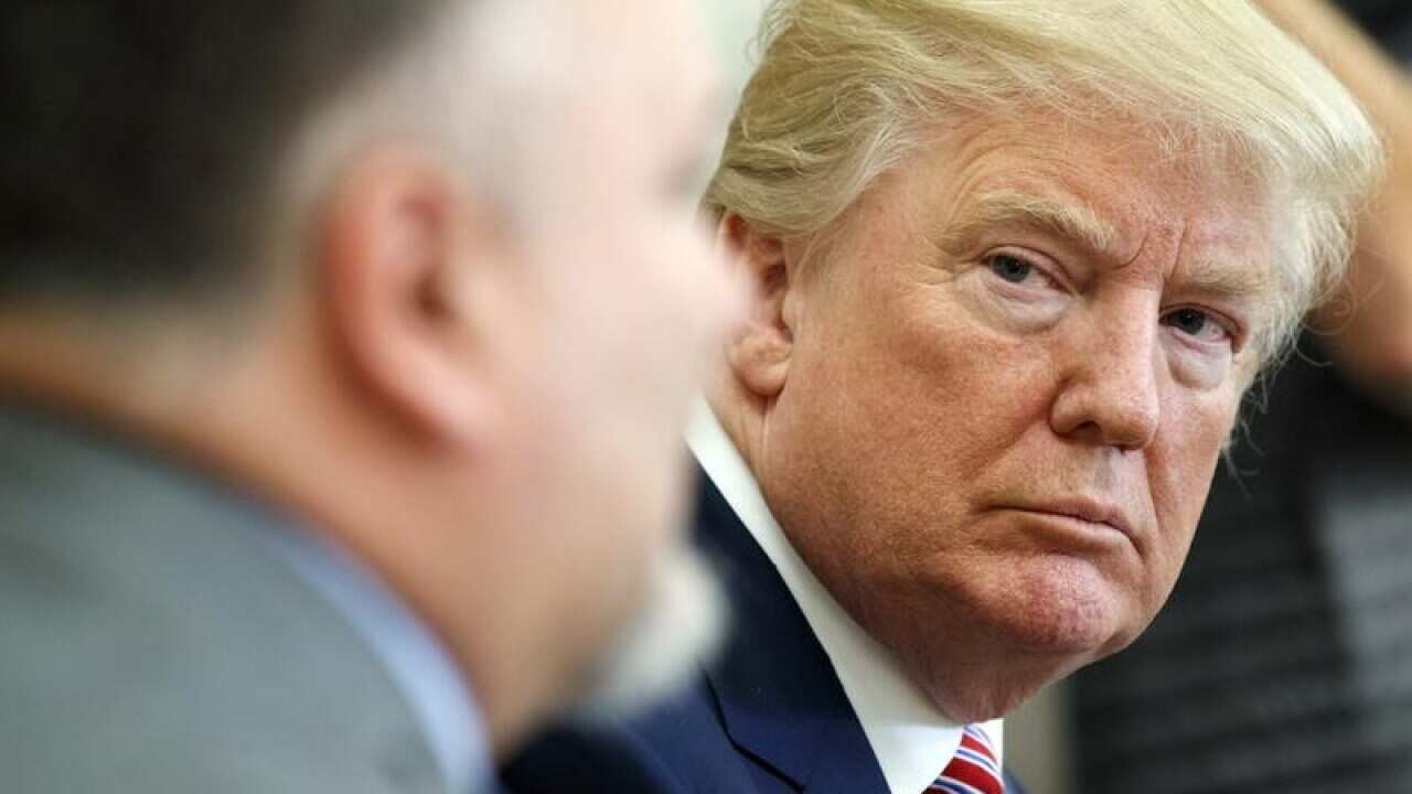 Donald Trump has blocked the release of a Democratic-written memo.