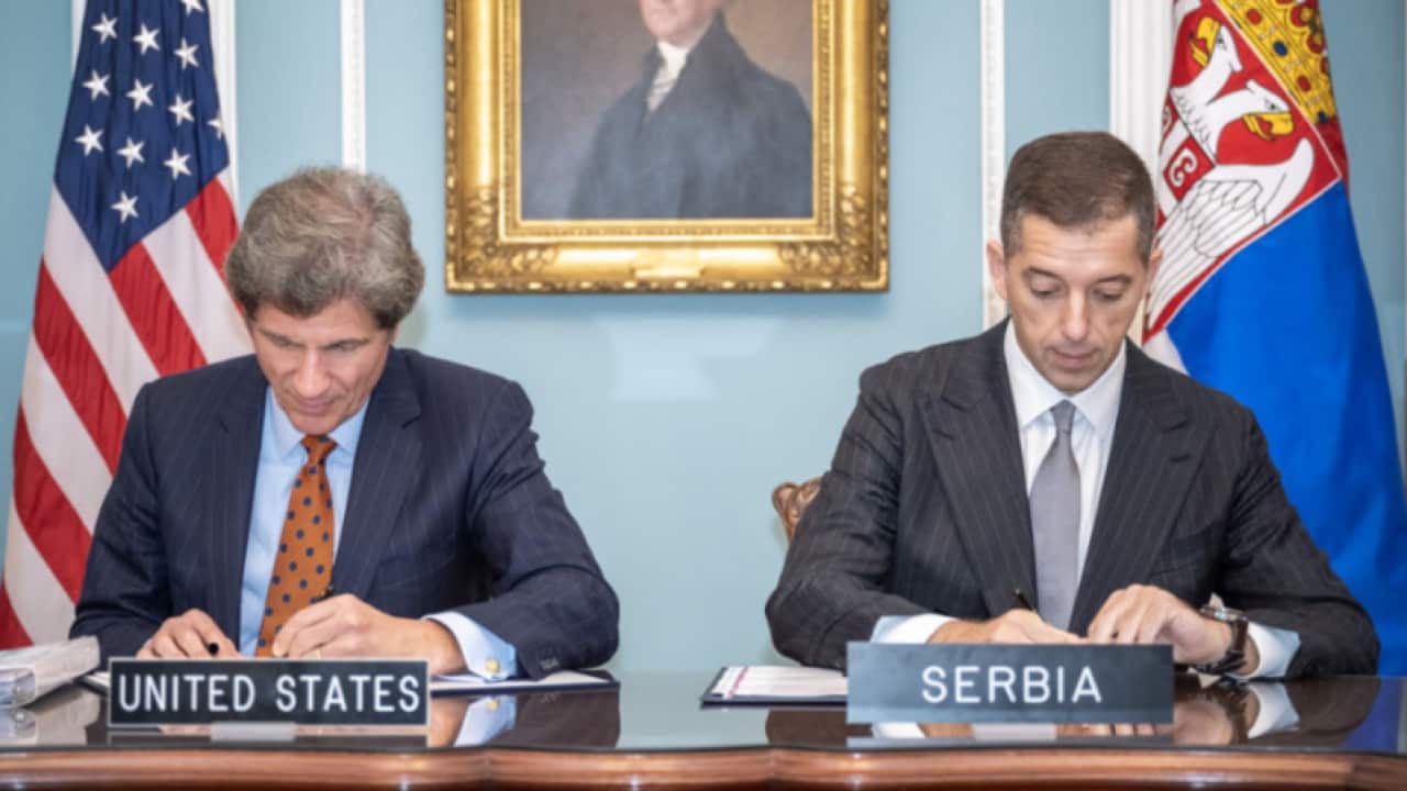 Serbian foreign Minister Marko Djuric (R) and the US Deputy Secretary Jose Fernandes sign the energy strategic partnership between two countries