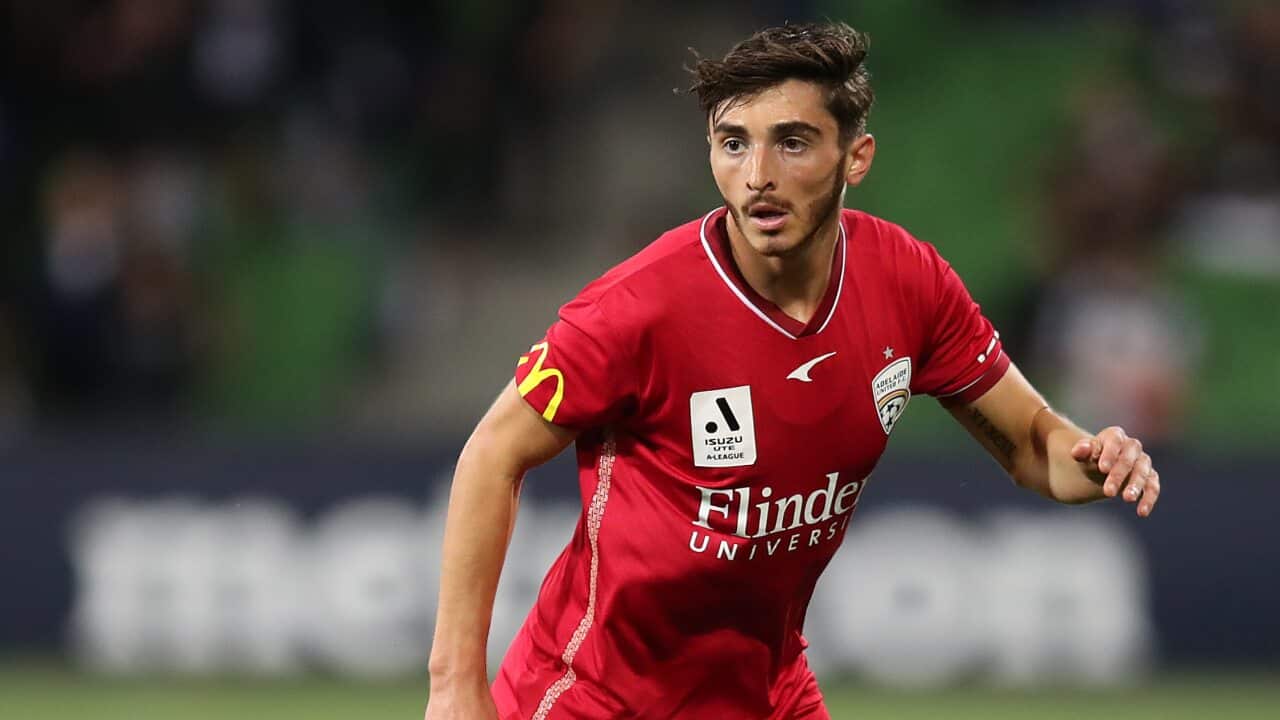 Joshua Cavallo of Adelaide United in action during the round nine A-League Men's match against Melbourne Victory on 8 January.