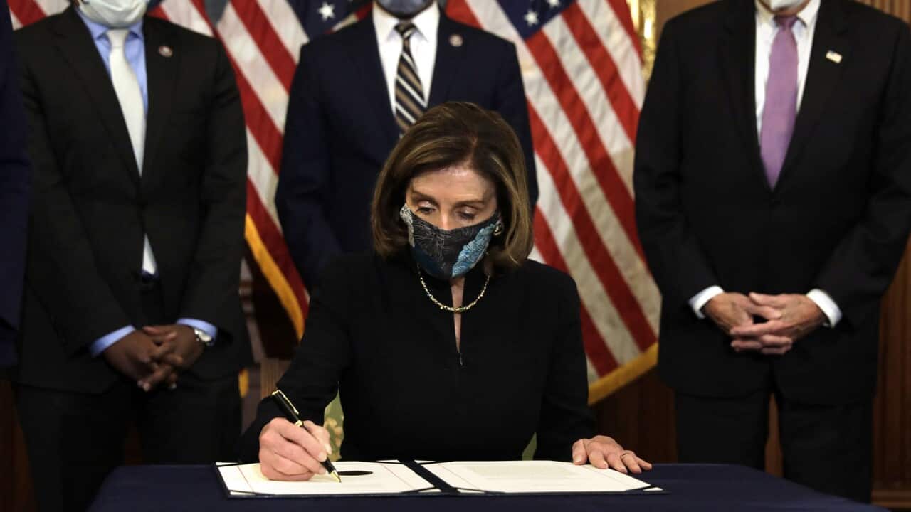 U.S. House Speaker Nancy Pelosi (D-CA) signs the article of the impeachment against President Donald Trump during an Engrossment Ceremony on Capitol Hill in Washington on January 13, 2021. Photo by Yuri Gripas/ABACAPRESS.COM.