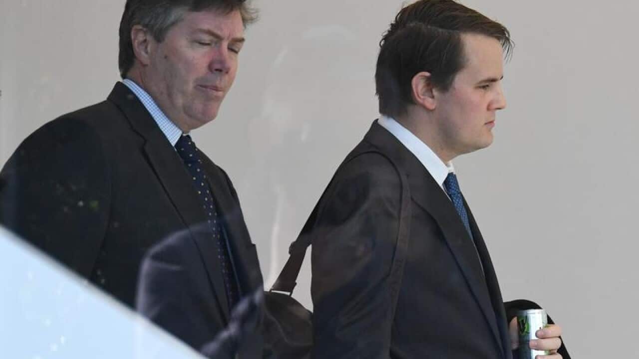 Dr Sean Wing arrives at Lidcombe Coroners Court.