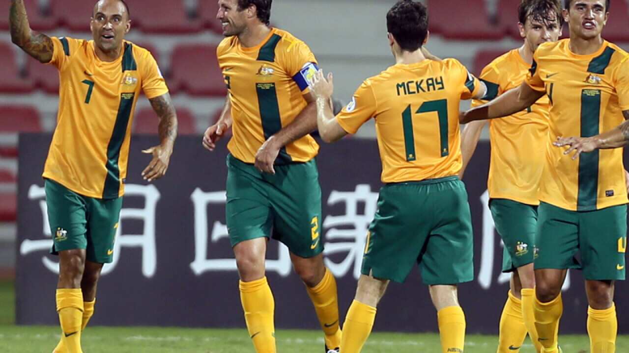 Socceroos back on track with Iraq win
