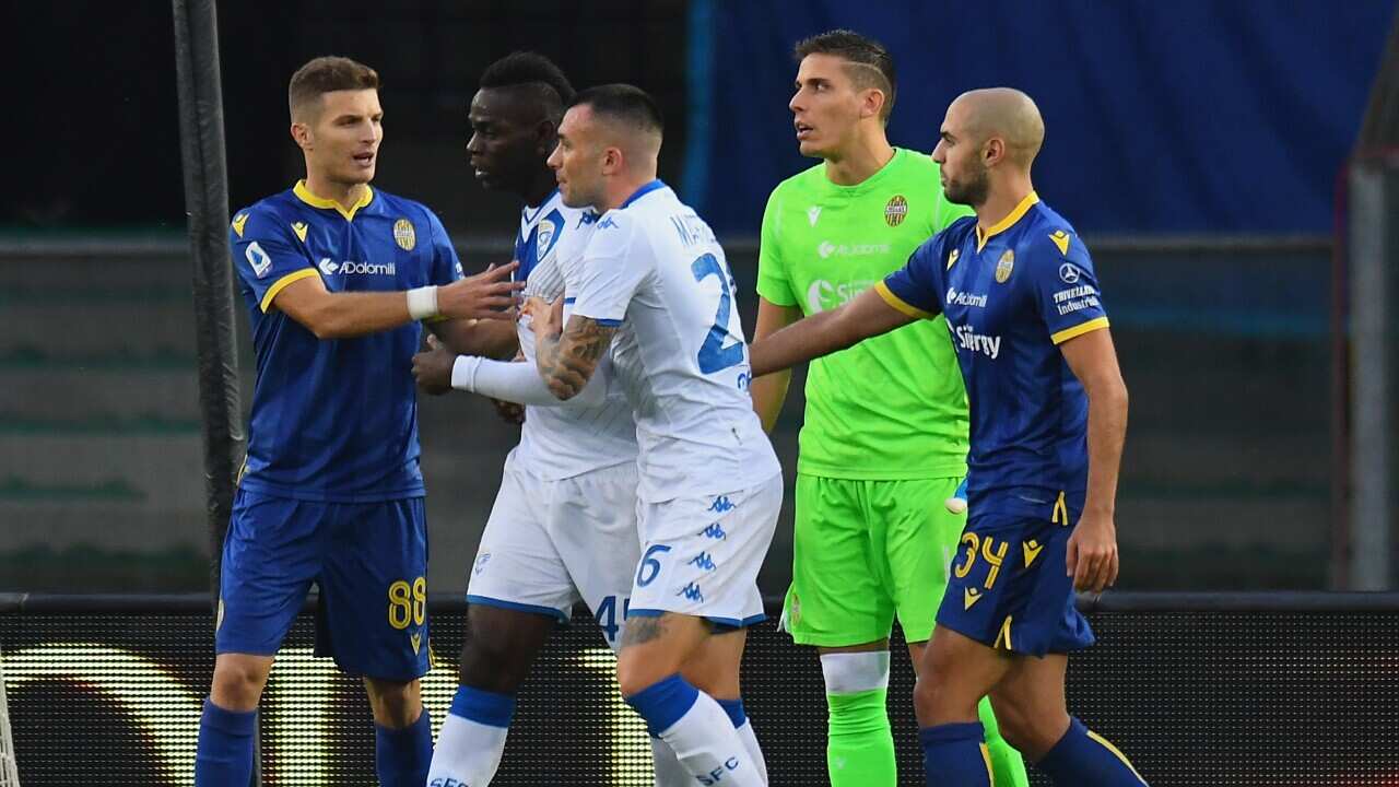 Mario Balotelli threatens to walk off the pitch after being subjected to racist taunts.