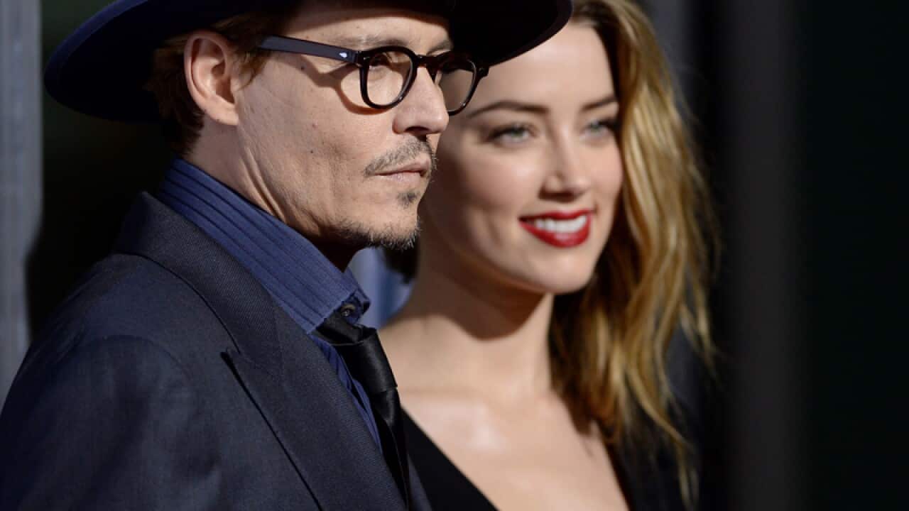 Johnny Depp (L) and Amber Heard