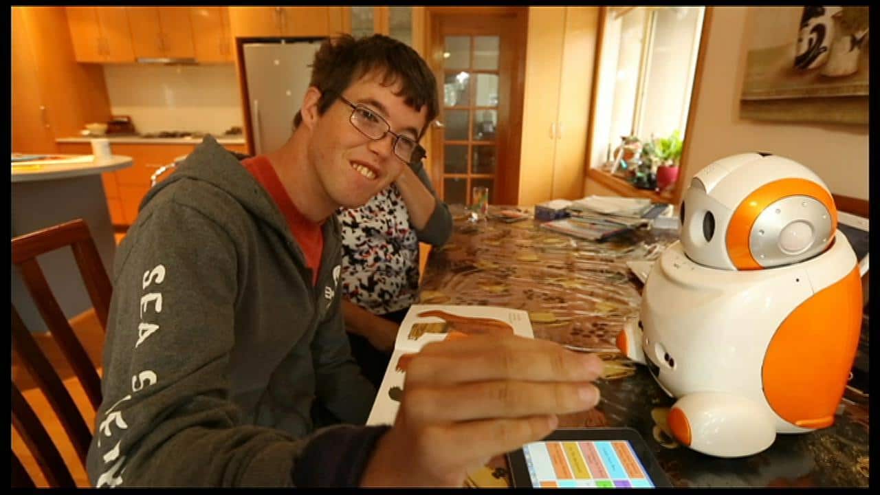 Christopher with the robot called Lucy.