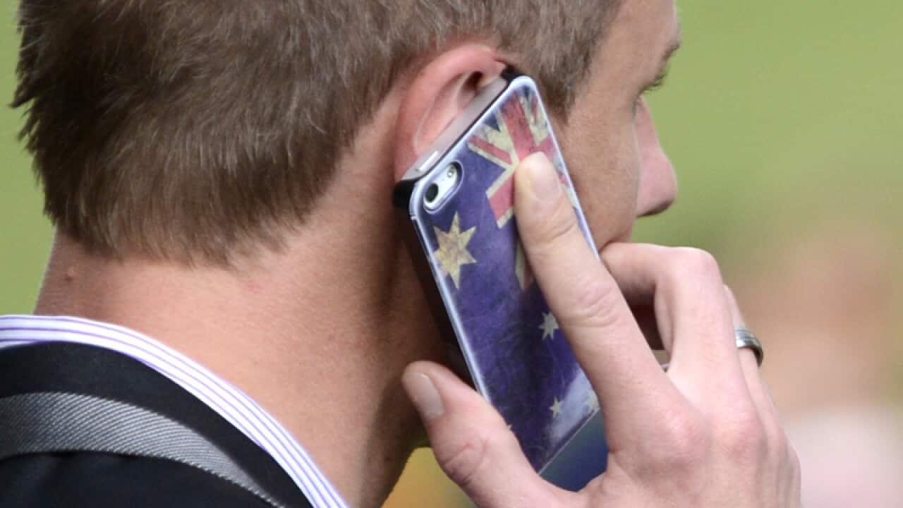 A man talks on his mobile phone in Brisbane