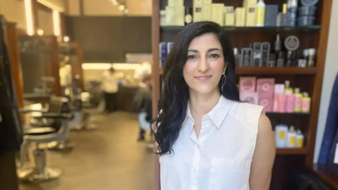 Sydney barbershop owner Renee Baltov is struggling to find workers.