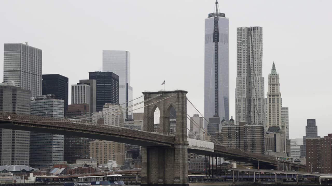 The One World Trade Center seen from across the Brooklyn Bridge