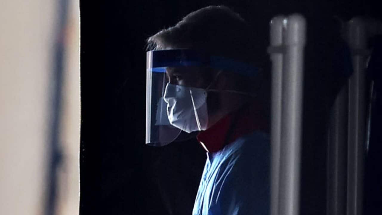 A healthcare worker.