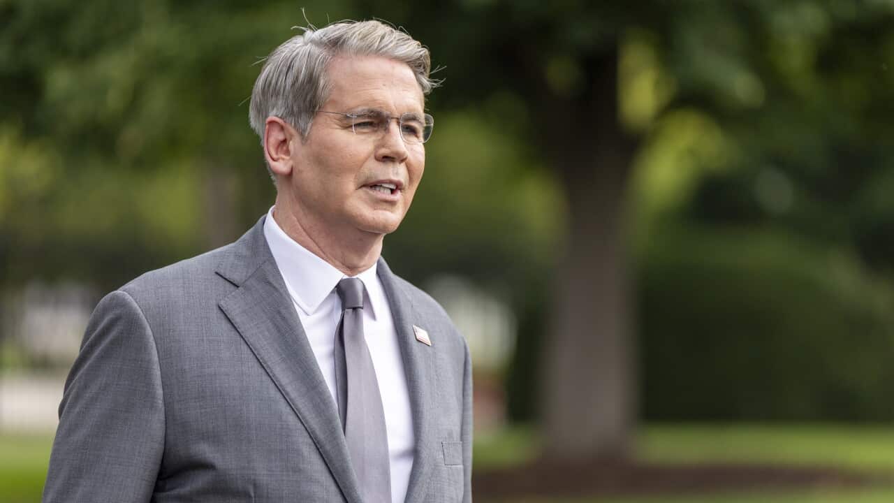 US Treasury Secretary Scott Bessent talks to reporters outside the White House