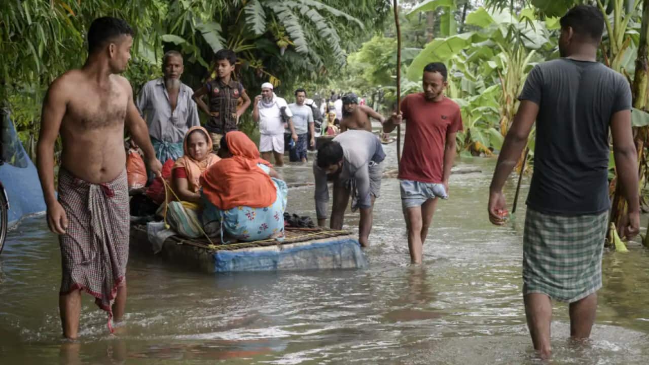 Flood-affected people being evacuated in Barpeta, India, on 17 June, 2022.