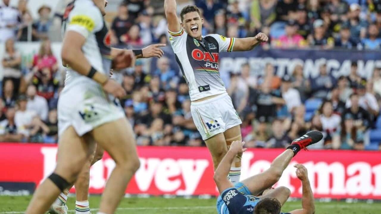 Nathan Cleary of the Panthers (centre) celebrates after kicking.