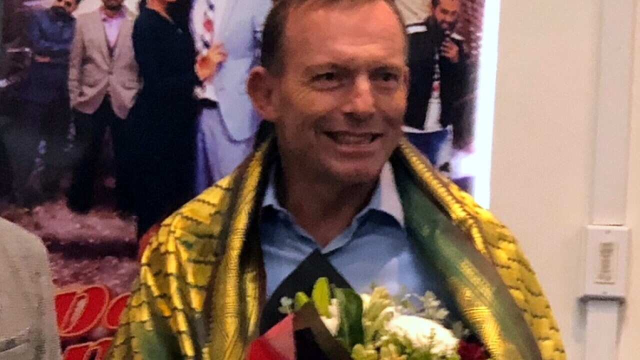 Former Prime Minister Tony Abbott at an Indian restaurant launch in Melbourne's south east on Saturday February 17