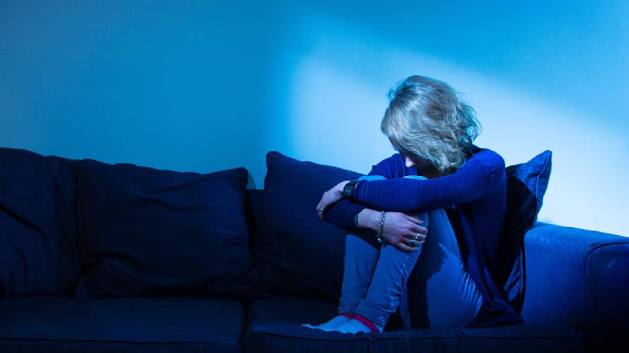 A woman showing signs of depression.