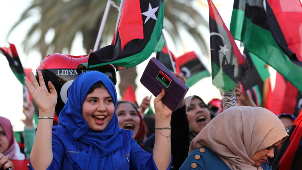 Libyans celebrate the anniversary of the fall of Muammar Gaddafi.