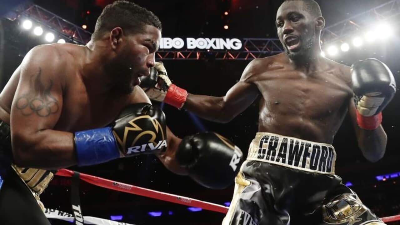 Terence Crawford punches Felix Diaz.