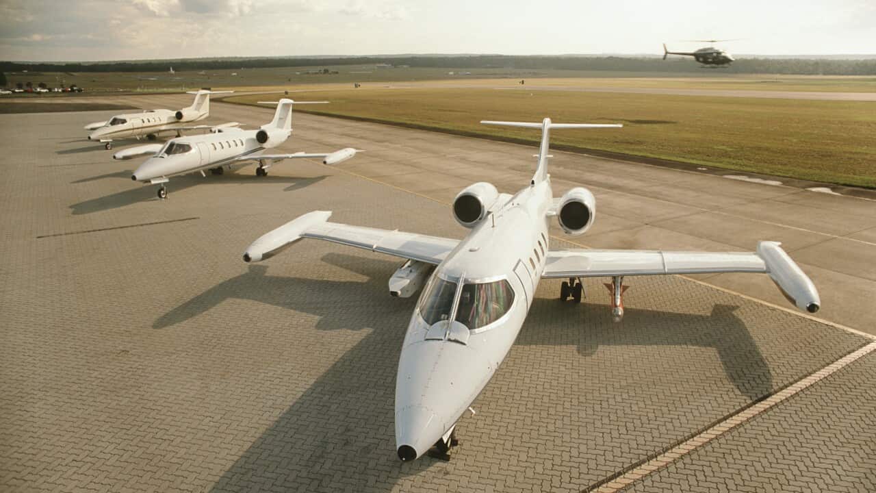 Stock image of jet planes on runway