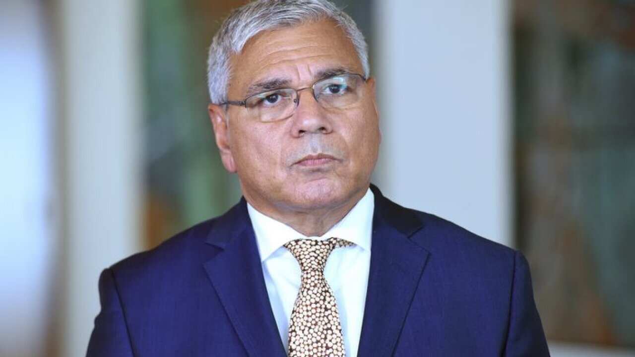 Australian Aboriginal leader Mundine speaks at a press conference at Parliament House in Canberra on Wednesday, Oct. 14, 2015. (AAP Image/Mick Tsikas) NO ARCHIVING